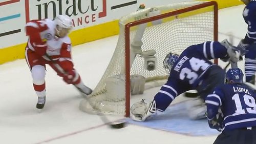 Reimer twists backward for great glove save